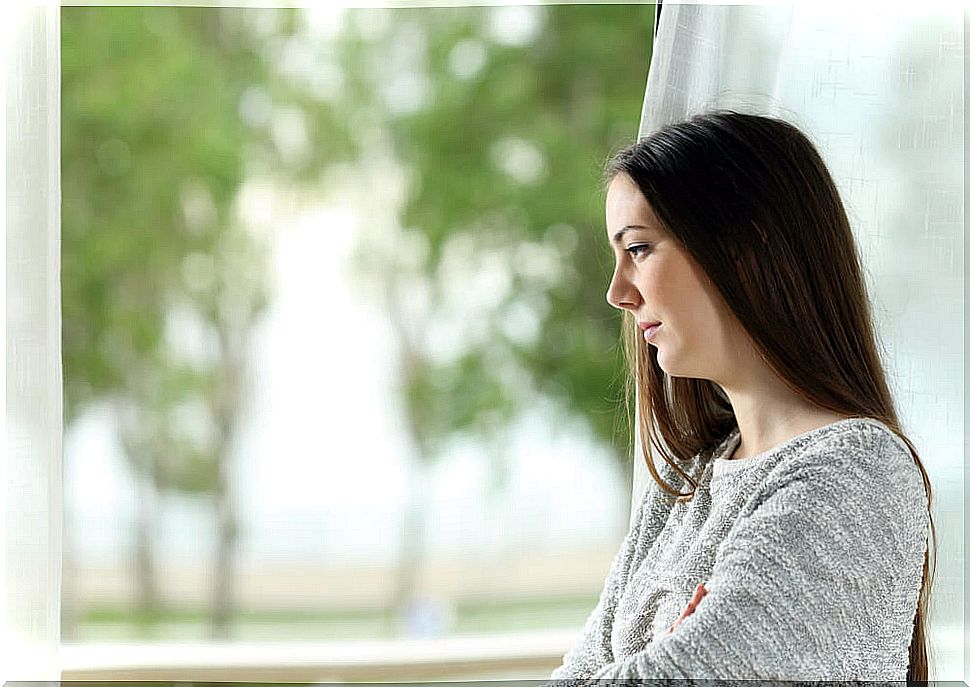 Melancholic woman thinking about how to eliminate emotional dependence from her life