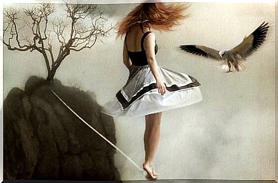 woman on a tightrope working out balanced thinking