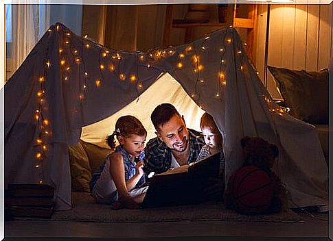 Father reading stories to the little ones