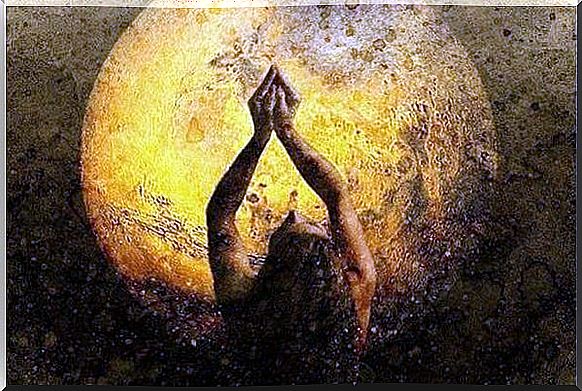 woman praising the moon and intuition