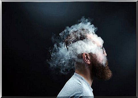 Man with a face full of smoke