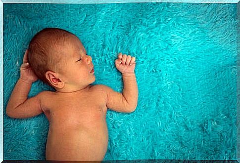 Baby on a blue blanket