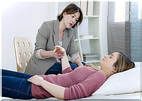 Psychologist doing clinical hypnosis to her patient