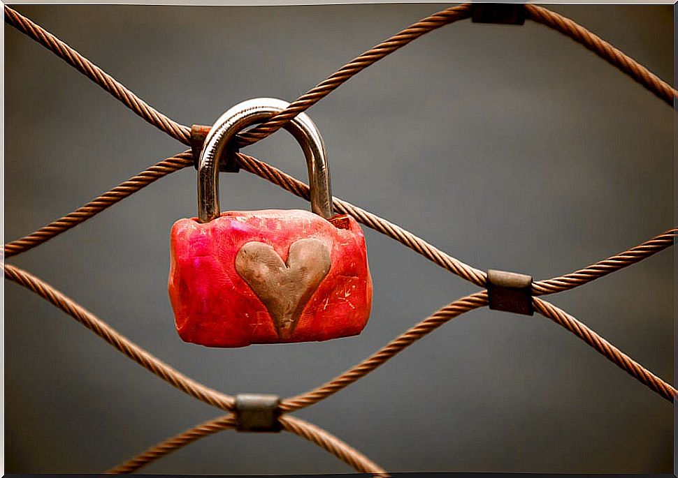 Padlock with heart symbolizing people addicted to relationships