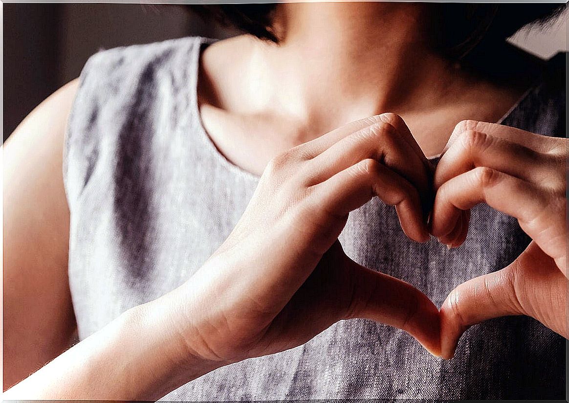 Woman making a heart with her hands