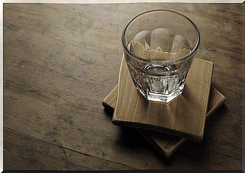 Empty glass on wooden table