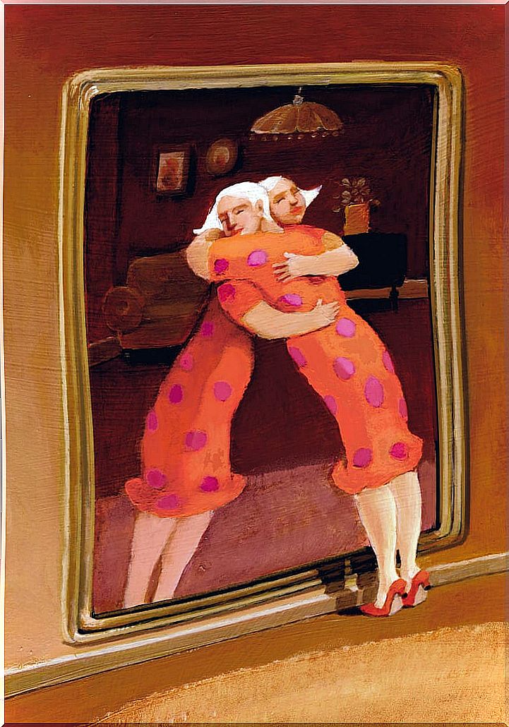 Woman hugging herself with her mirror image