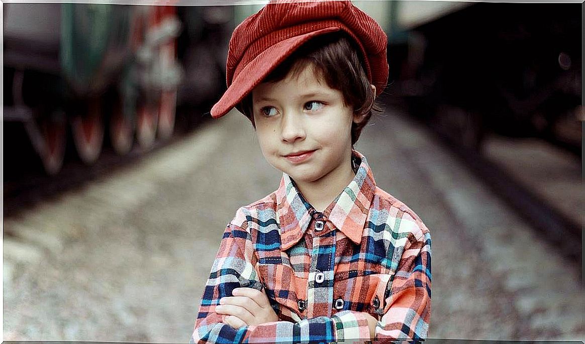 boy with red cap representing the principle of curiosity