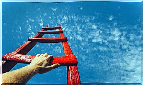 Man climbing a ladder to heaven to represent the Grit theory