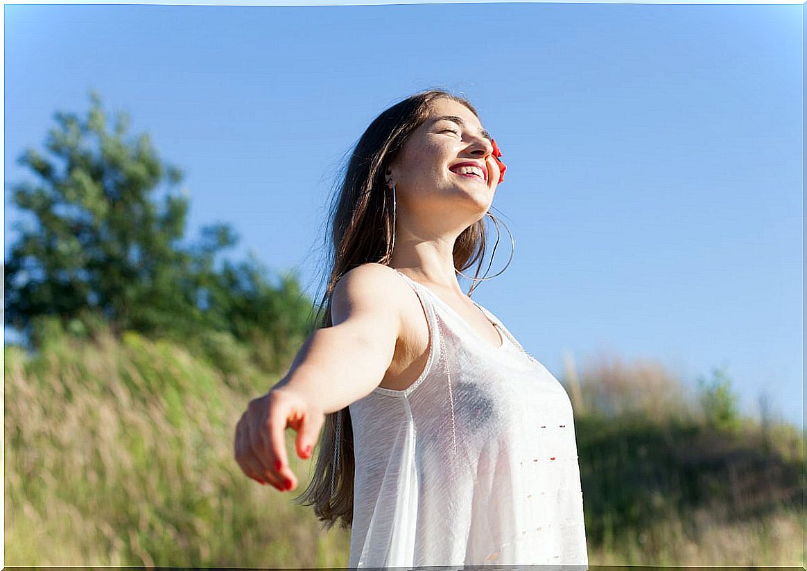 Woman smiling outdoors