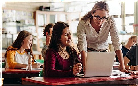 Teacher with students in class